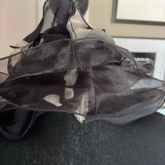 Elegant Black and White Halter-Top Jumpsuit with Ruffled Detail - Picture 16 of 16